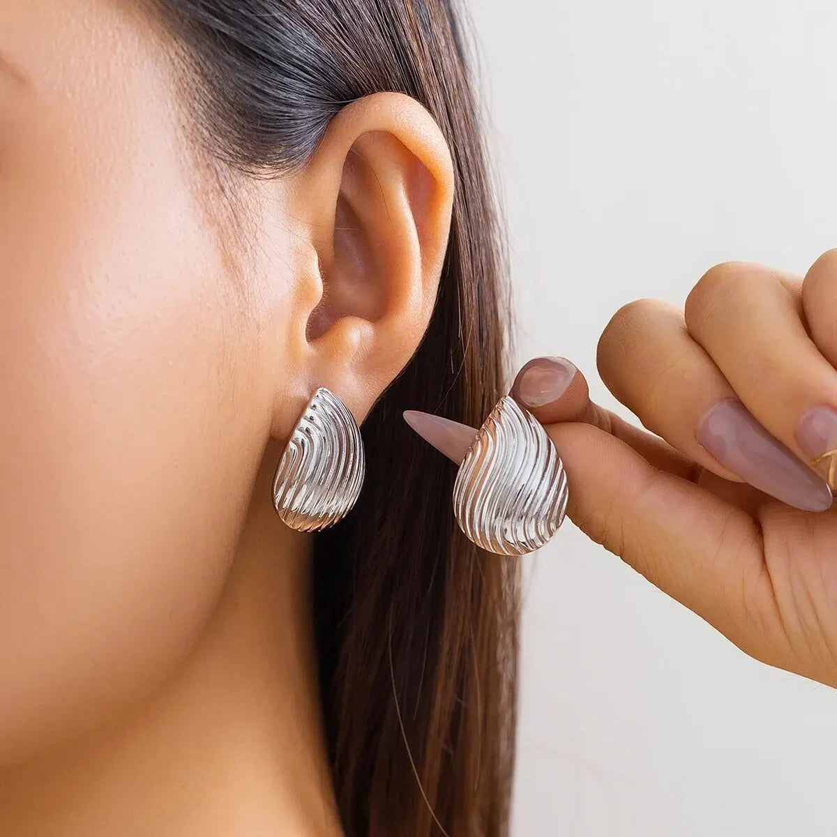 Elegant lotus pendant earrings for evening wear