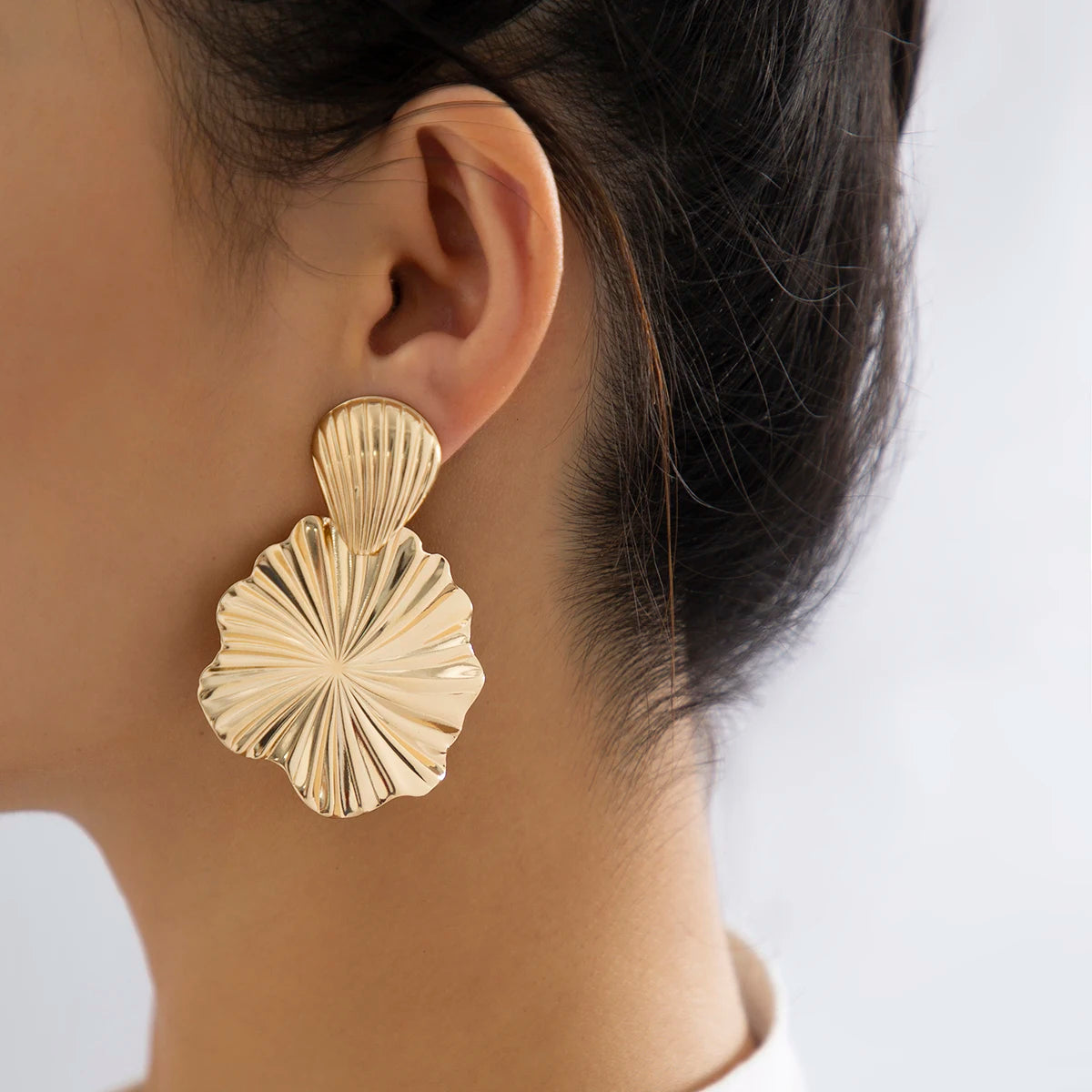 Statement geometric earrings with lotus design