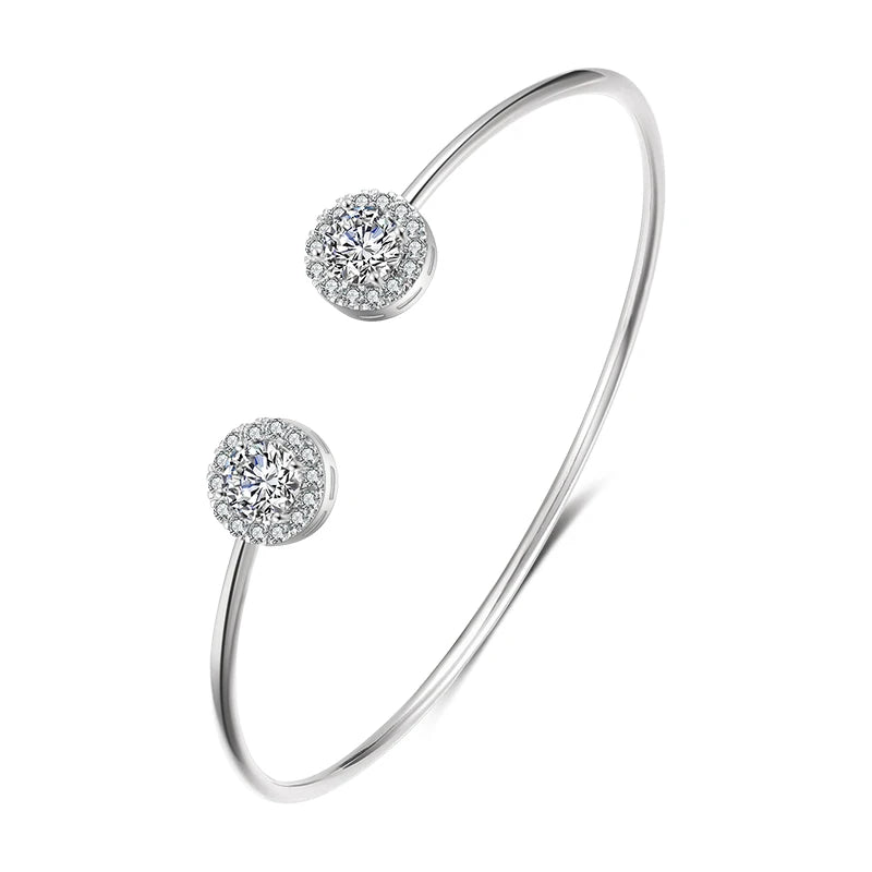 Glamorous gold bangle close-up with sparkling zirconia stones